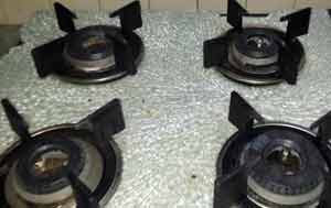 Glass of glass top gas stove broken